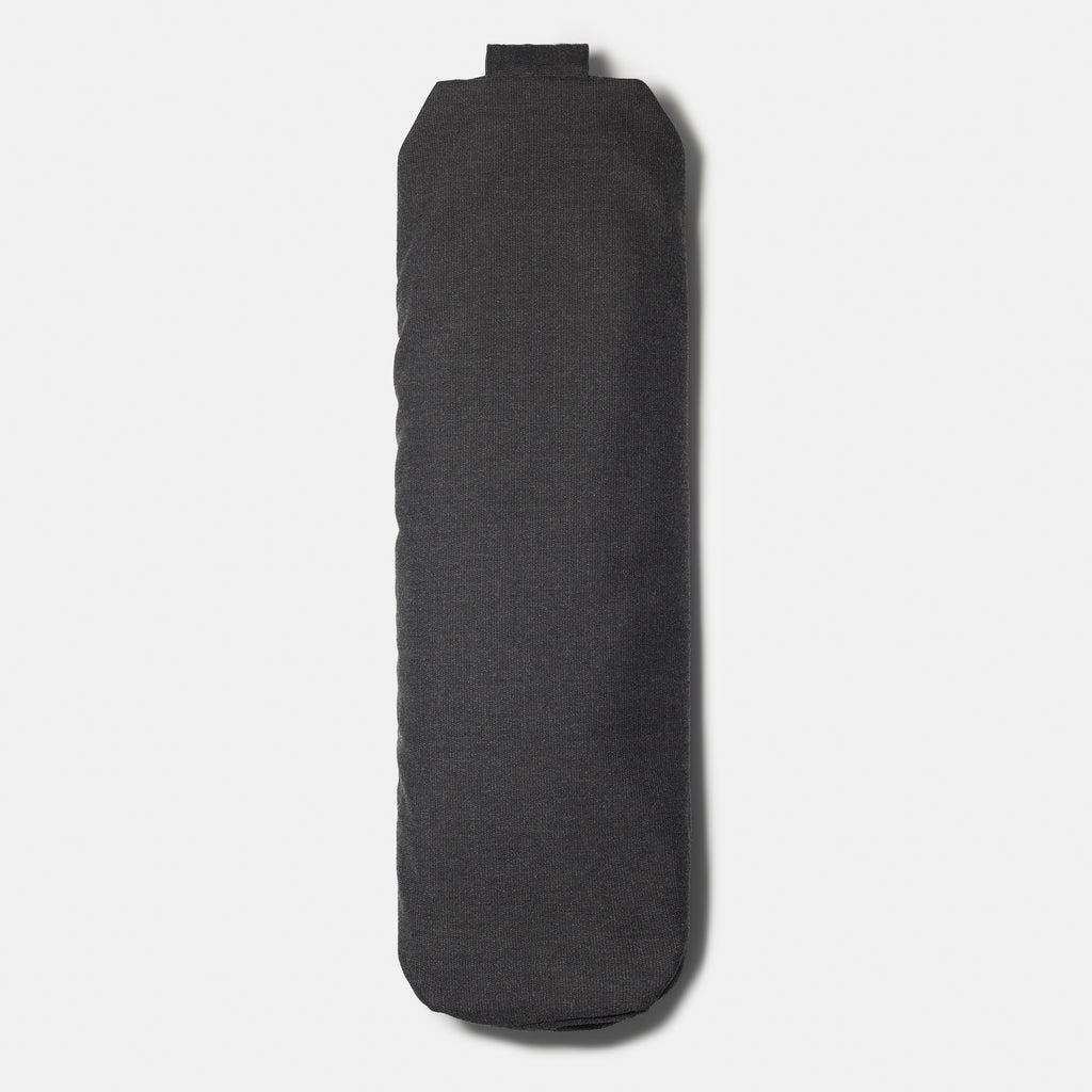 head on vertical view of long bolster with carrying handle visible.