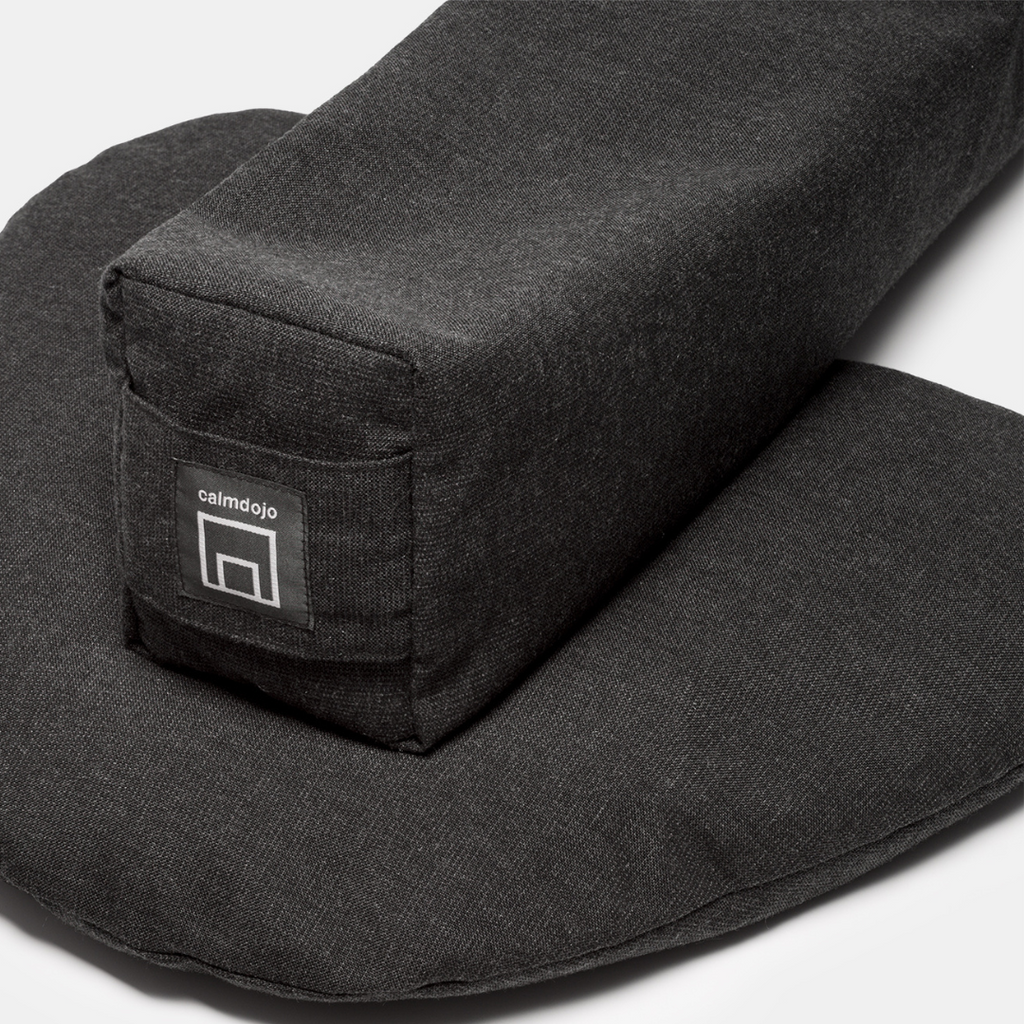 small heart shaped pillow and long bolster in dark gray.